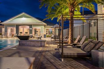 Idyllic Pool Sundeck Lit Up At Night